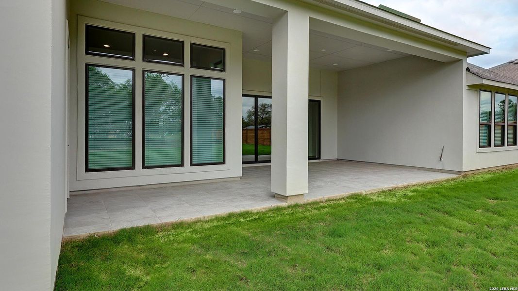Exterior details and patio area of a home in Megan's Landing, Castroville (Image 3).