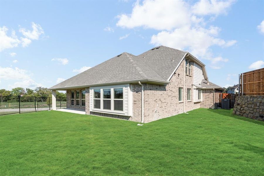 Front exterior of a new home in Ridge Ranch Classic 50, Mesquite, TX, highlighting curb appeal (Image 24). Front exterior of a new home in Ridge Ranch Classic 50, Mesquite, TX, highlighting curb appeal (Image 24).