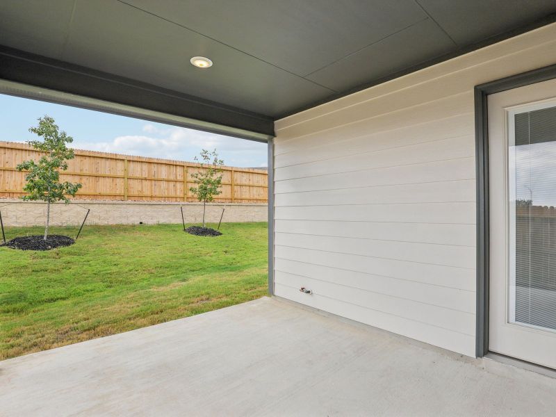 Back patio of elevation B of a Callaghan in a Meritage Homes community.