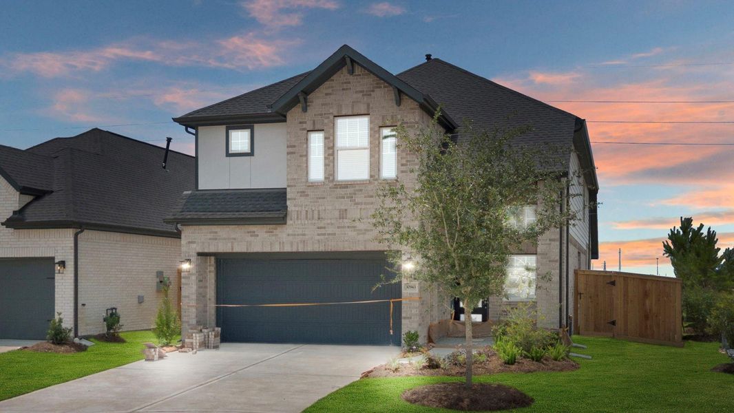 Front exterior of a new home in Jordan Ranch, Fulshear, TX, highlighting curb appeal (Image 23). Front exterior of a new home in Jordan Ranch, Fulshear, TX, highlighting curb appeal (Image 23).