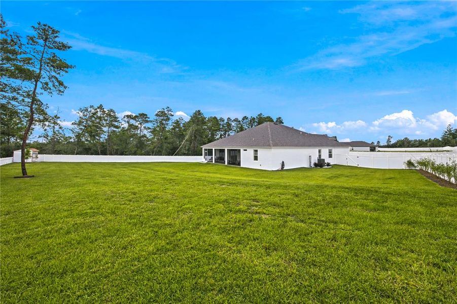 Exterior details and patio area of a home in Marion Oaks, Ocala (Image 26).