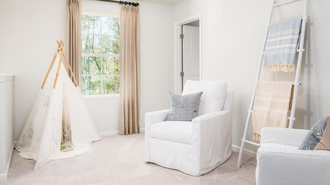 Furnished interior view inside a new home in Lindera Preserve at Cane Bay Plantation: American Dream Series, Summerville (Image 15). Furnished interior view inside a new home in Lindera Preserve at Cane Bay Plantation: American Dream Series, Summerville (Image 15).