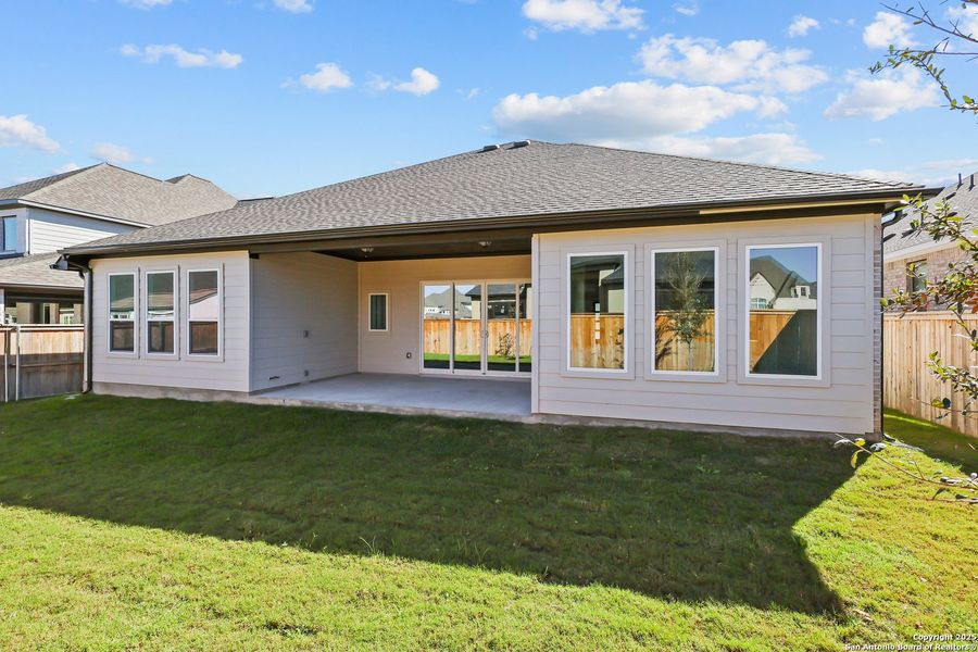 Exterior details and patio area of a home in Mayfair 60', New Braunfels (Image 27).