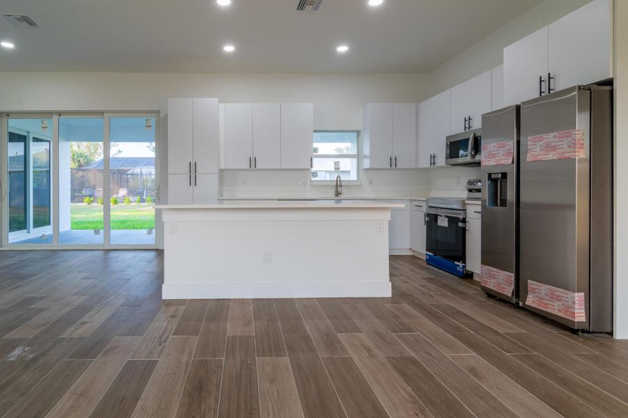 Furnished interior view inside a new home in , Port Charlotte (Image 5). Furnished interior view inside a new home in , Port Charlotte (Image 5).
