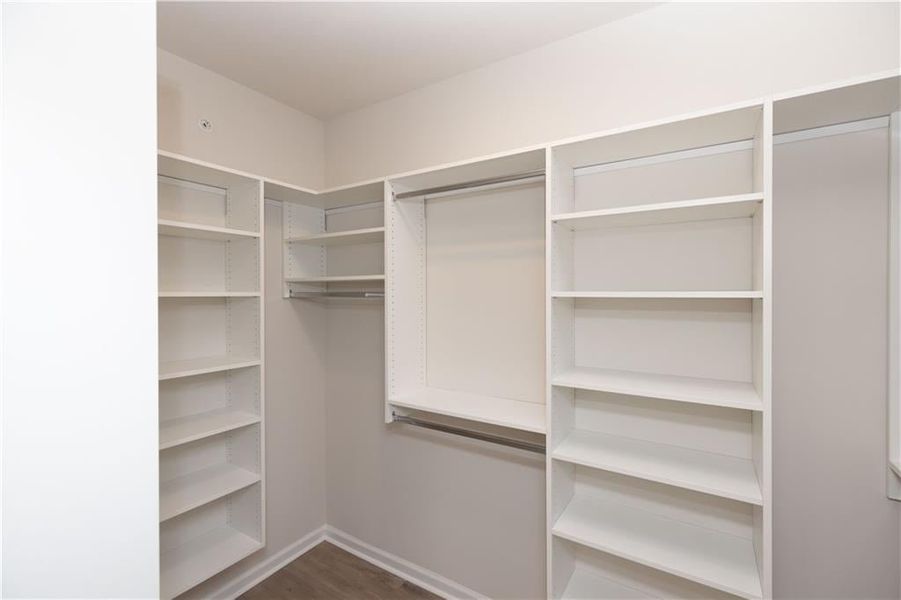 Custom closet design in Owners Suite