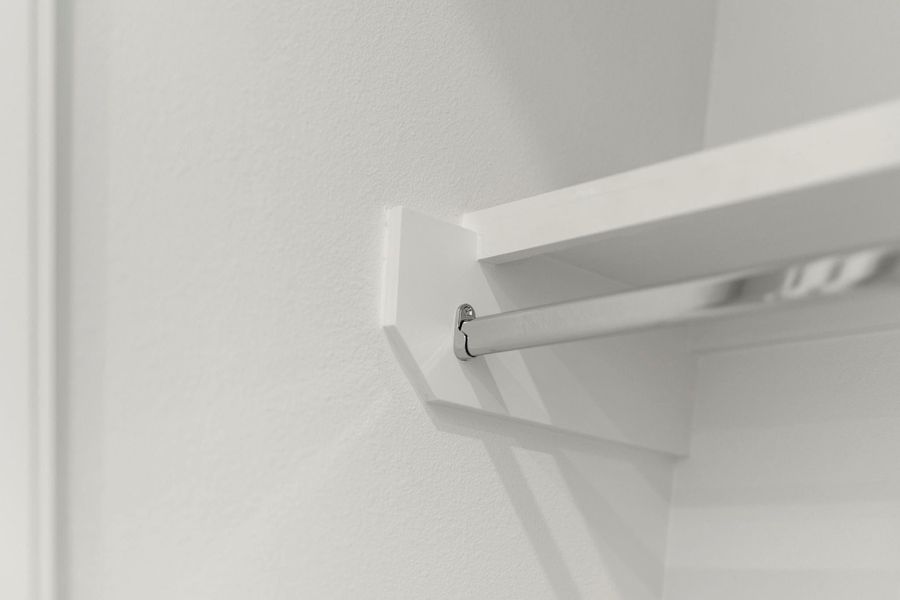 Metal rails included in all closets