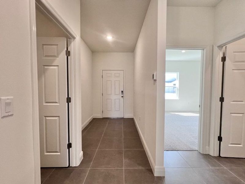 Spacious, unfurnished interior of a new home in Lakes At St Sebastian, Micco (Image 13).