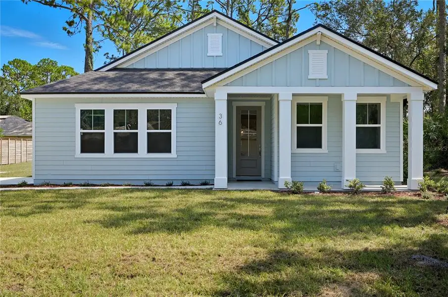 Exterior details and patio area of a home in Palm Coast Homes, Palm Coast (Image 3).