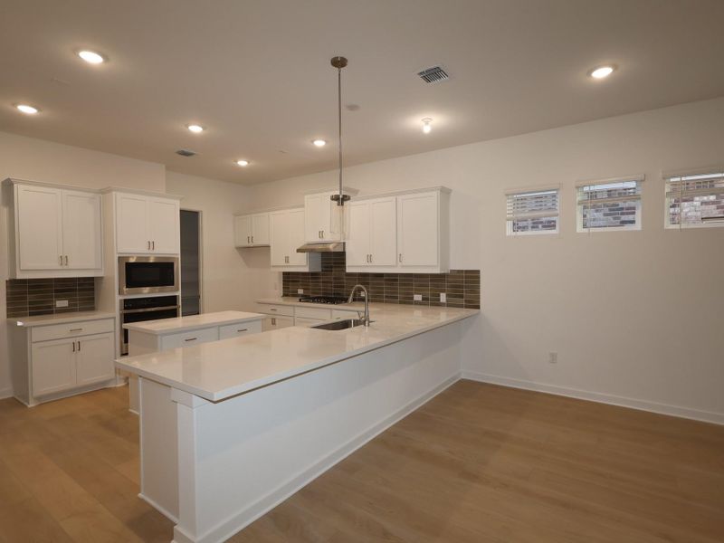 Furnished interior view inside a new home in Edgewood, Leander (Image 6).