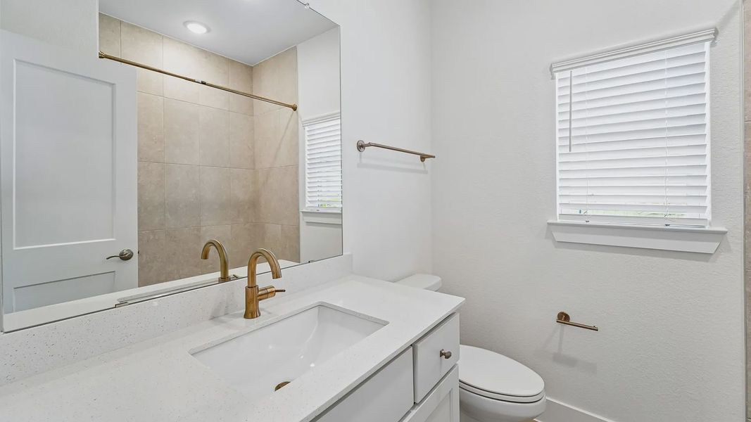 Representative furnished interior of a home built from the Cayman by Chesmar Homes in Crescent Bluff, Georgetown (Image 19).