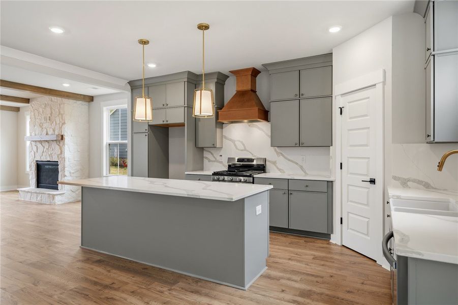 This spacious kitchen offers an island, modern app
