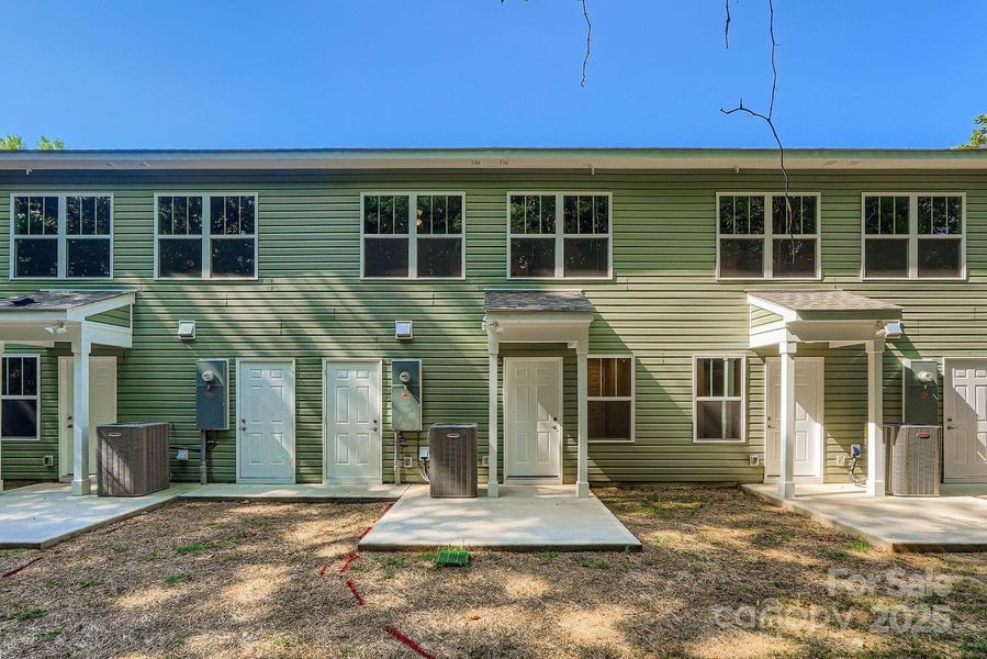 Front exterior of a new home in , Charlotte, NC, highlighting curb appeal (Image 17).