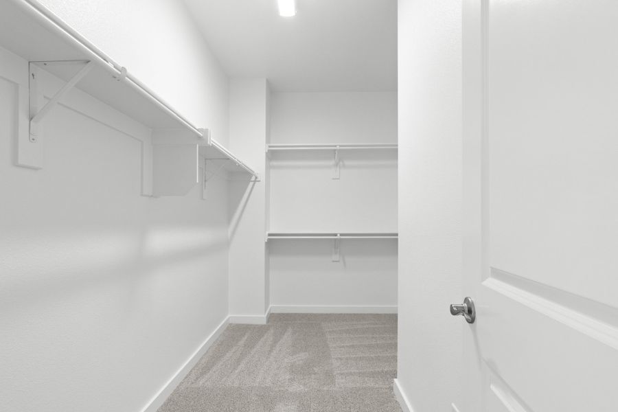 Spacious, unfurnished interior of a new home in The Tribute, The Colony (Image 41).