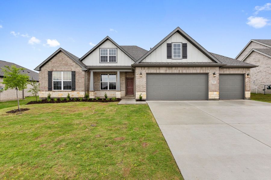 Front exterior of a new home in Waverly Estates, Nevada, TX, highlighting curb appeal (Image 42).