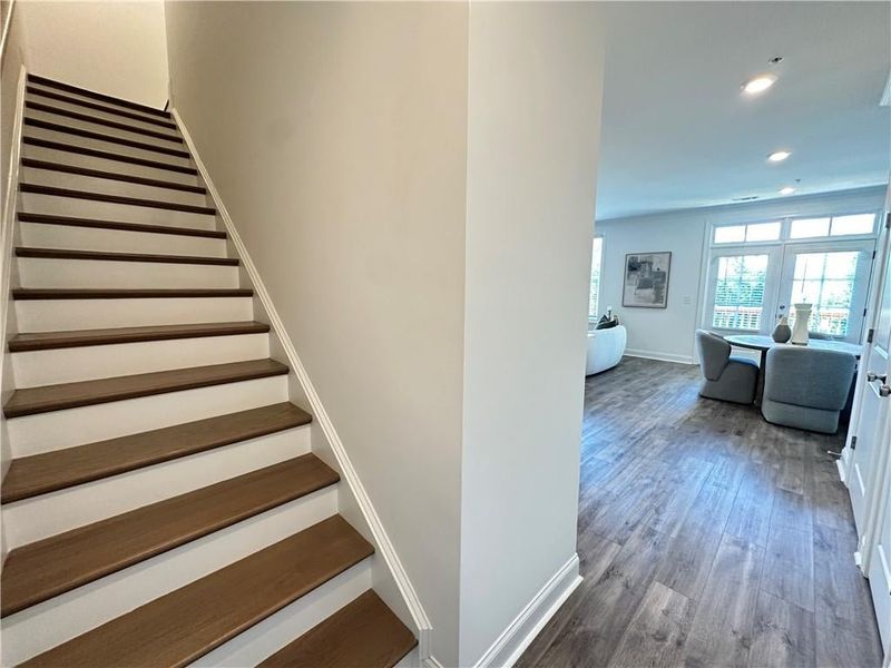 Hardwood stairs leading to upper level *photos are from the Magnolia model at different home site*