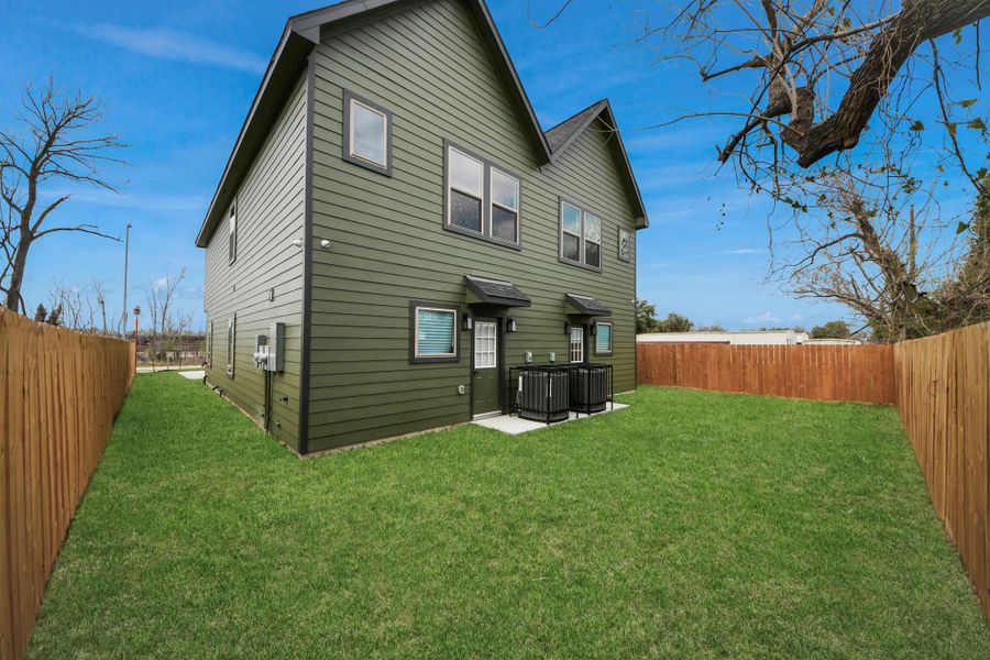 Exterior details and patio area of a home in , Houston (Image 3).