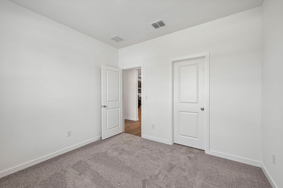 Representative unfurnished interior of a home built from the 3501 by Risewell Homes in Parkton Square, Kyle (Image 13).