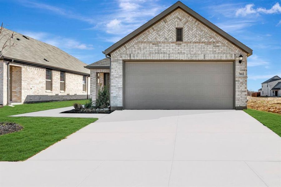 Front exterior of a new home in Meadow Park, Denton, TX, highlighting curb appeal (Image 23). Front exterior of a new home in Meadow Park, Denton, TX, highlighting curb appeal (Image 23).