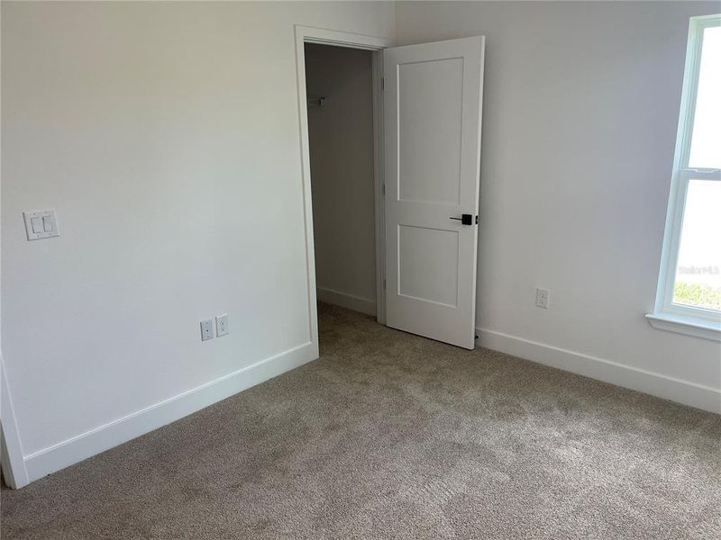Spacious, unfurnished interior of a new home in Harmony Central, St. Cloud (Image 8).
