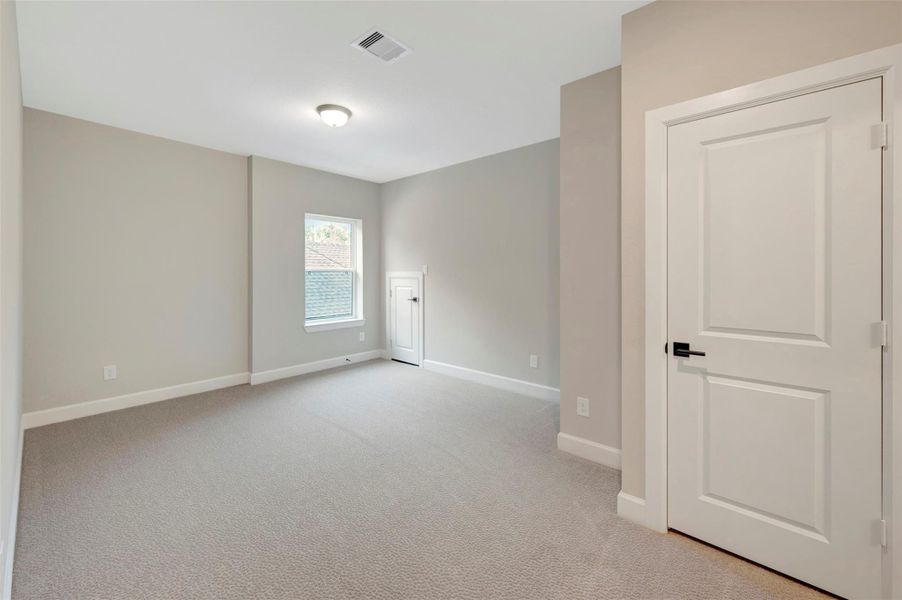 Spacious, unfurnished interior of a new home in The Woodlands Hills 70’, Willis (Image 21).