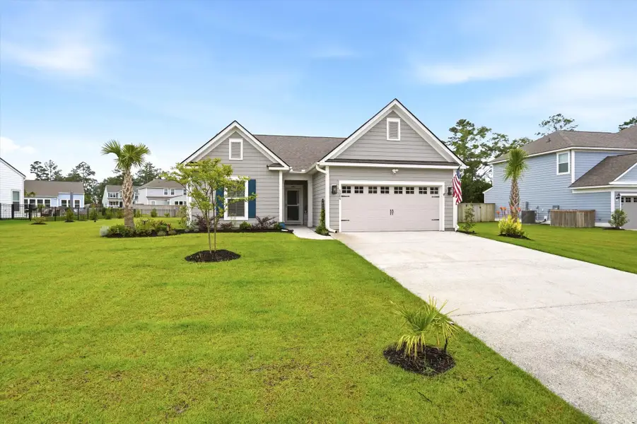 Front exterior of a new home in , Johns Island, SC, highlighting curb appeal (Image 2). Front exterior of a new home in , Johns Island, SC, highlighting curb appeal (Image 2).