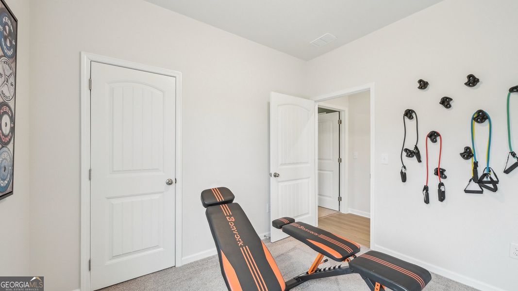 Furnished interior view inside a new home in Maddox Station, Eatonton (Image 17).