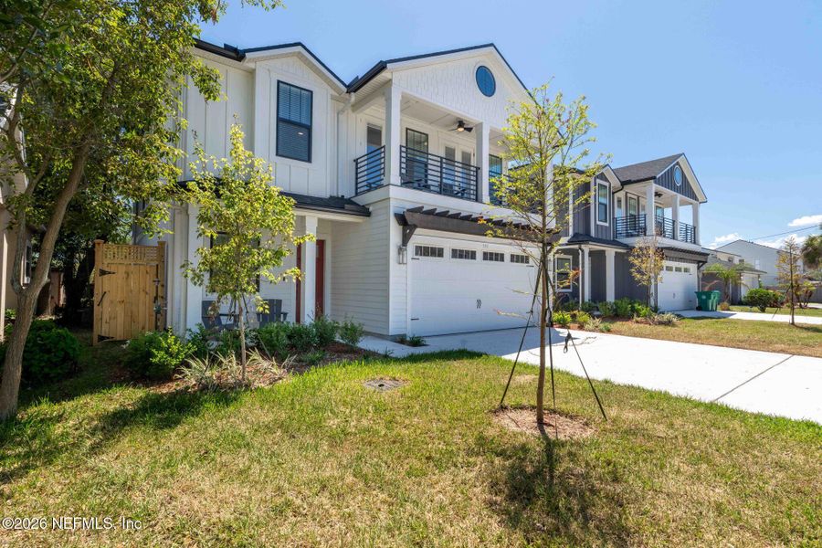 Front exterior of a new home in , Jacksonville Beach, FL, highlighting curb appeal (Image 24).