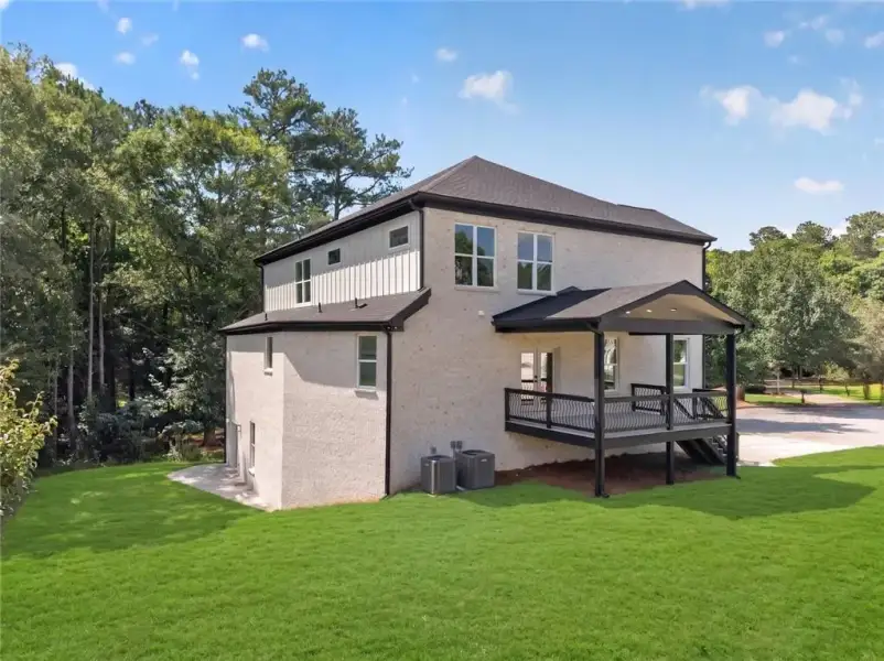 Exterior details and patio area of a home in , Loganville (Image 25).