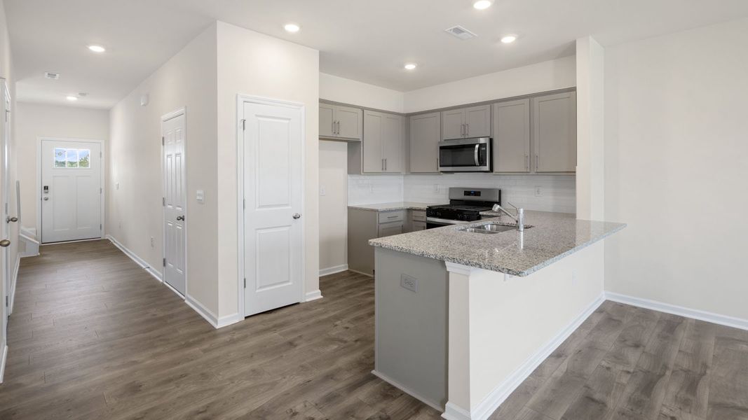 Furnished interior view inside a new home in Clock Road Townhomes, New Bern (Image 7).