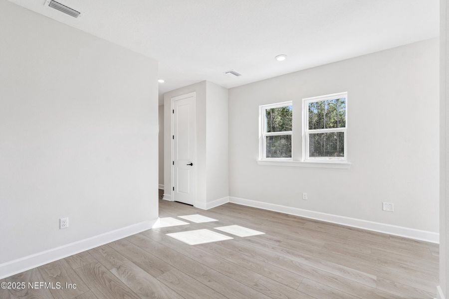 Spacious, unfurnished interior of a new home in Evergreen Island at Silverleaf - Classic, St. Augustine (Image 15). Spacious, unfurnished interior of a new home in Evergreen Island at Silverleaf - Classic, St. Augustine (Image 15).
