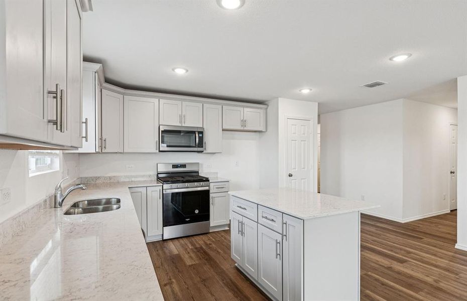 Airy kitchen with ample cabinet space Airy kitchen with ample cabinet space