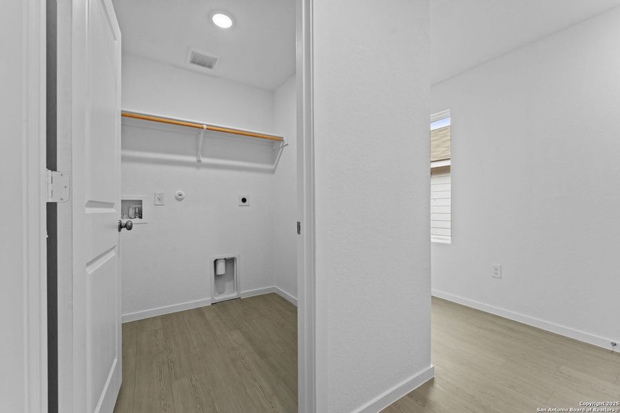 Spacious, unfurnished interior of a new home in Torian Village: Belmar Collection, San Antonio (Image 18).