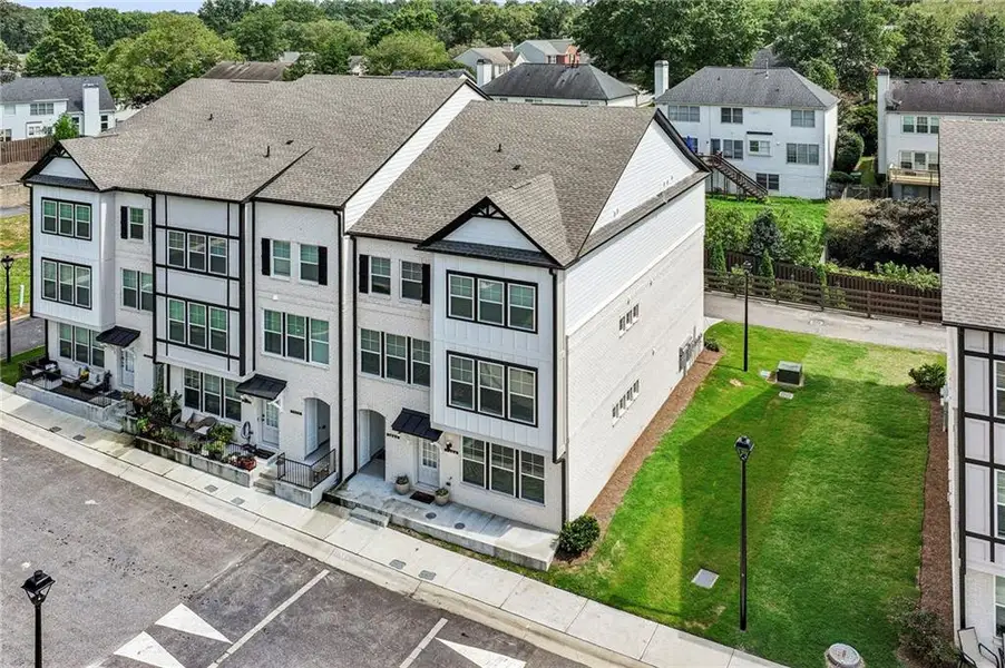 Front exterior of a new home in Town Center Overlook, Peachtree Corners, GA, highlighting curb appeal (Image 23).