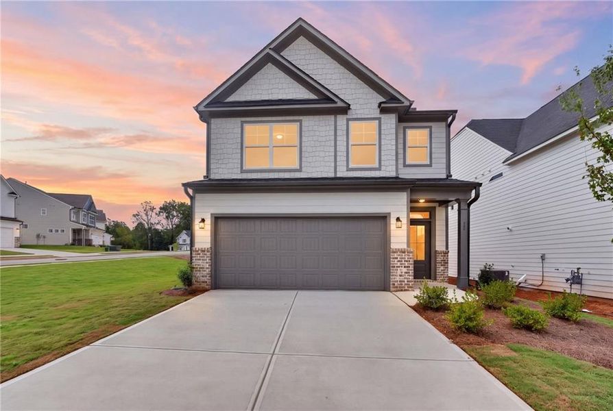 Front exterior of a new home in Villas at Dawsonville, Dawsonville, GA, highlighting curb appeal (Image 26). Front exterior of a new home in Villas at Dawsonville, Dawsonville, GA, highlighting curb appeal (Image 26).