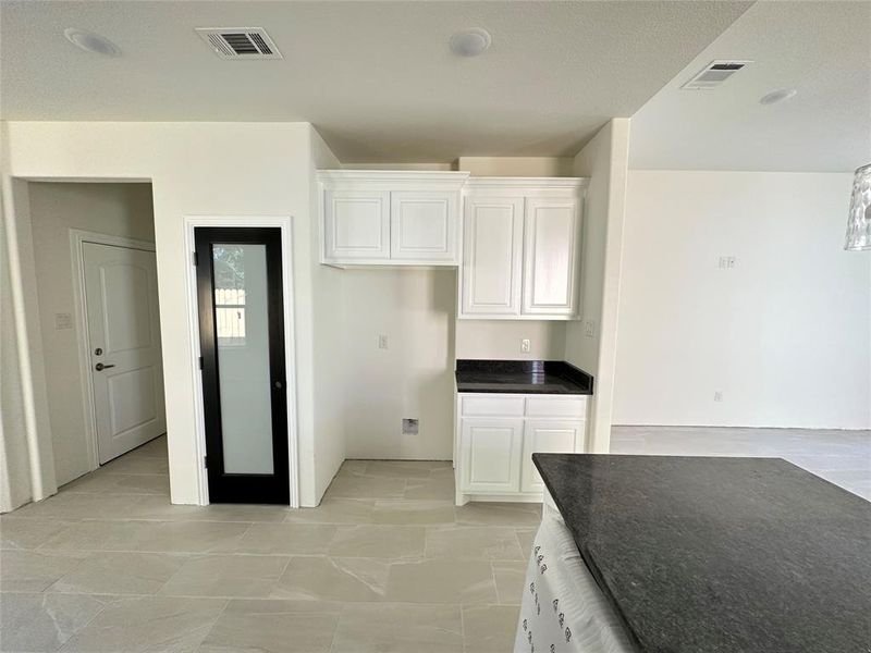 Kitchen with white cabinets