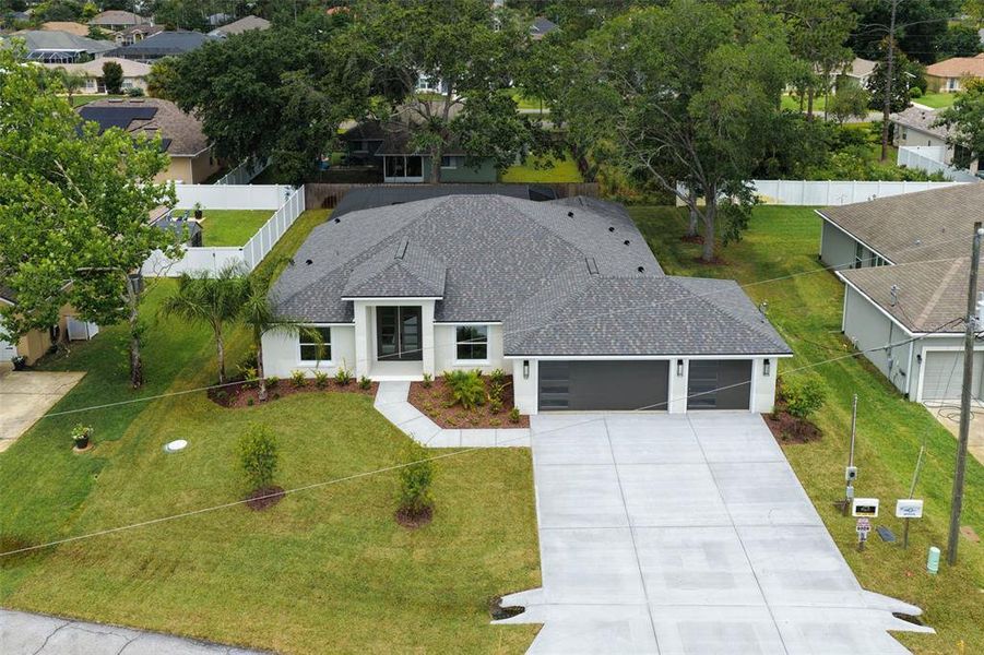 Front exterior of a new home in , Palm Coast, FL, highlighting curb appeal (Image 30).