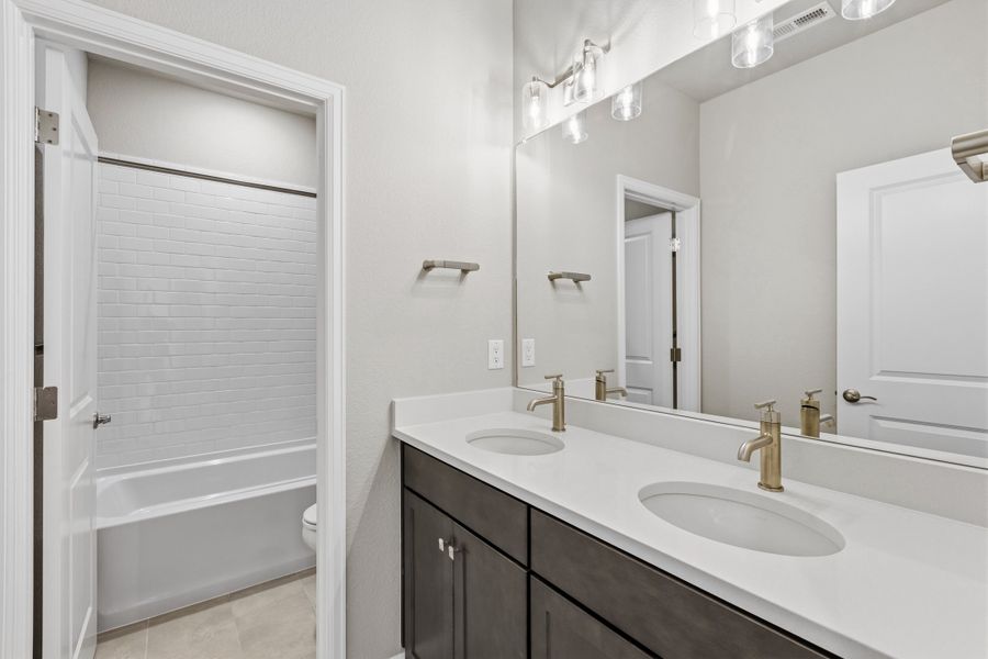 Furnished interior view inside a new home in The Estates Collection at Murphy Creek, Aurora (Image 11).
