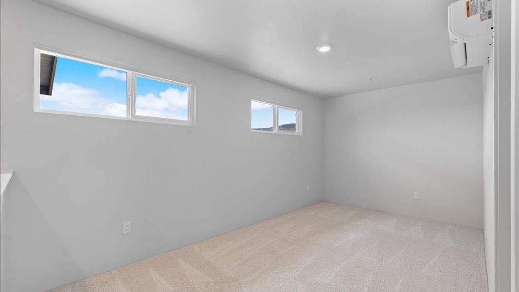 Representative unfurnished interior of a home built from the E104 by D.R. Horton in Monarch Ranch, Manor (Image 12).