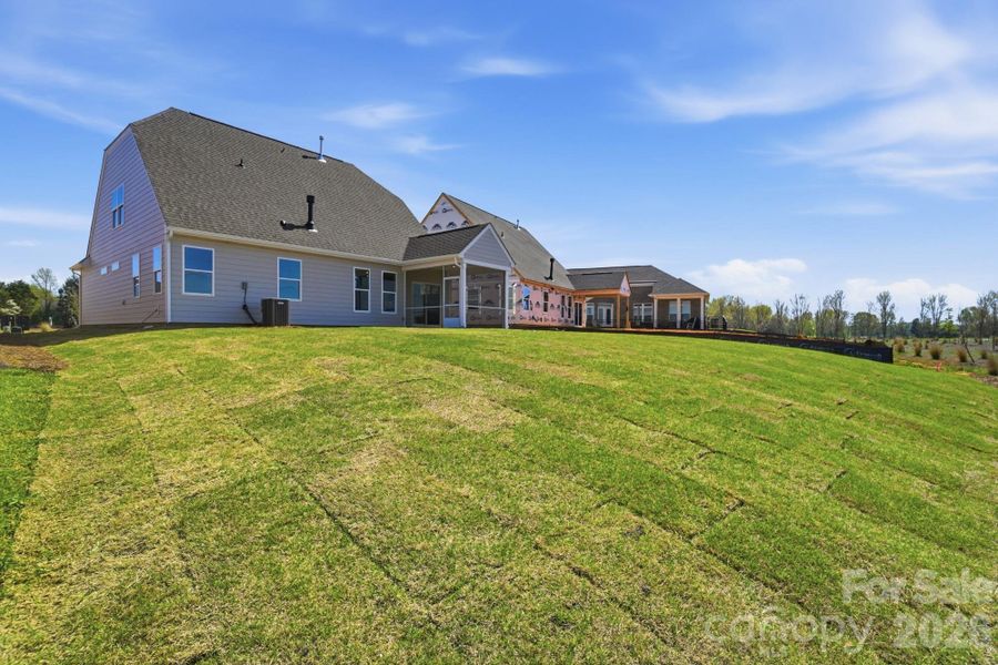 Exterior details and patio area of a home in Founders Landing | 55+ Community, Gastonia (Image 19).
