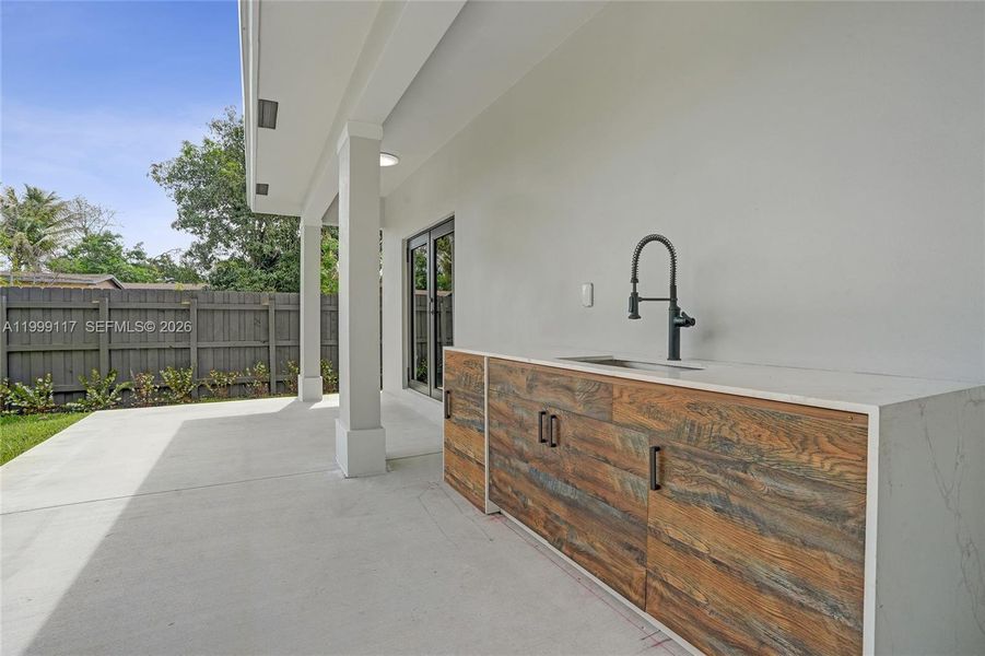 Exterior details and patio area of a home in , West Park (Image 34).