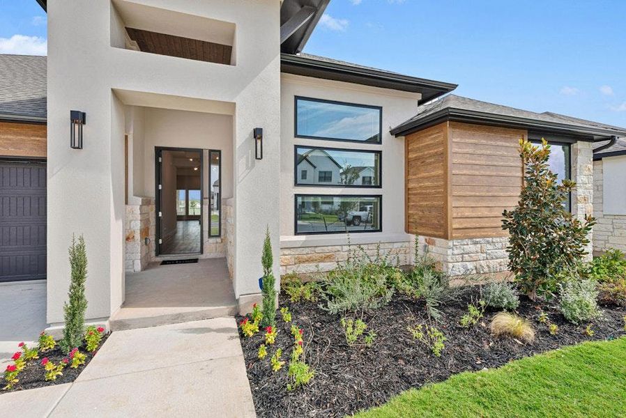 Exterior details and patio area of a home in Santa Rita Ranch, Liberty Hill (Image 3).