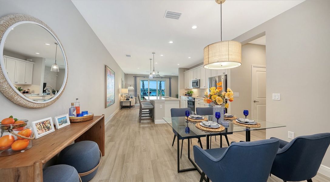 Representative furnished interior of a home built from the Avery by Neal Communities in SkySail, Naples (Image 17).