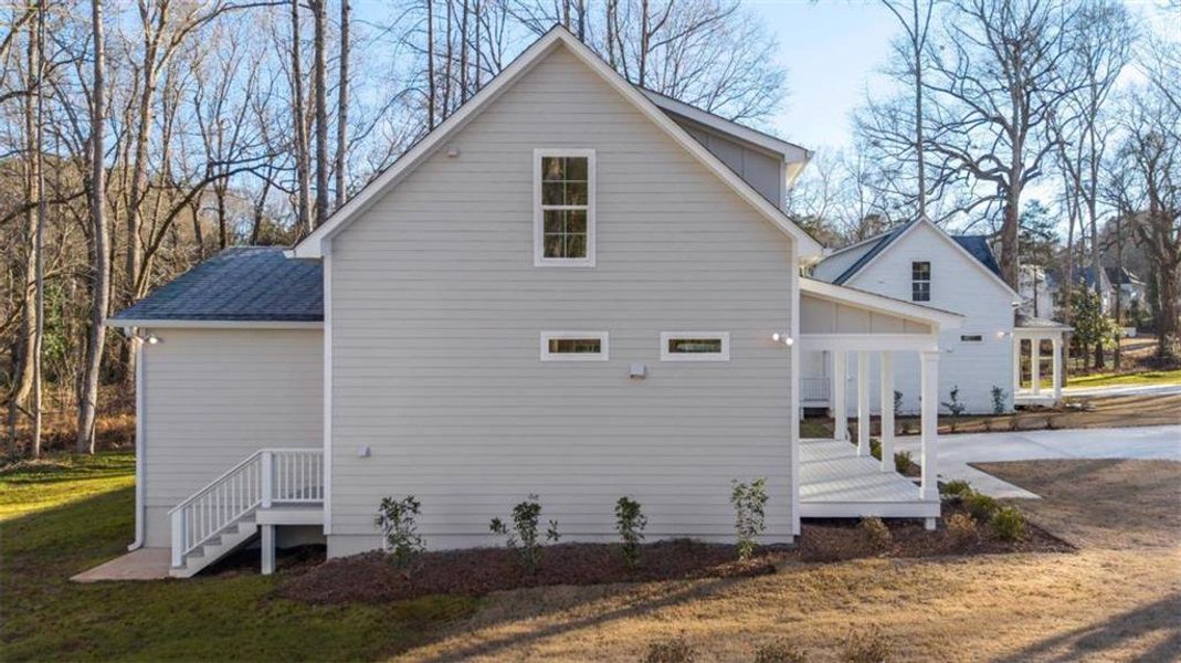 Front exterior of a new home in , Bowdon, GA, highlighting curb appeal (Image 2). Front exterior of a new home in , Bowdon, GA, highlighting curb appeal (Image 2).