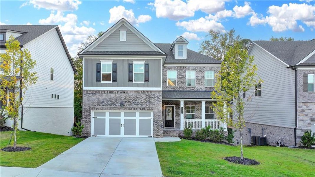 Front exterior of a new home in , Lawrenceville, GA, highlighting curb appeal (Image 21).