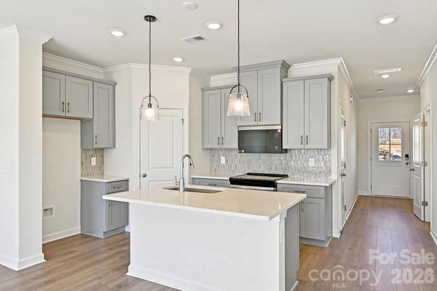 Furnished interior view inside a new home in Meadows at Wilson Farms - The Summit Series, Fort Mill (Image 10). Furnished interior view inside a new home in Meadows at Wilson Farms - The Summit Series, Fort Mill (Image 10).