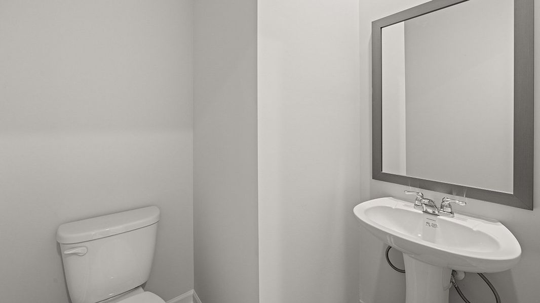 Representative furnished interior of a home built from the SALISBURY 24'  TOWNHOME by D.R. Horton in Waypoint, Flowery Branch (Image 10).