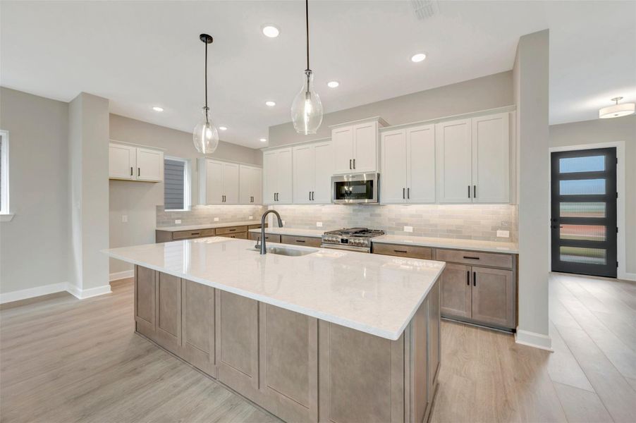 Furnished interior view inside a new home in Pomona - Grove Row Collection, Manvel (Image 13).