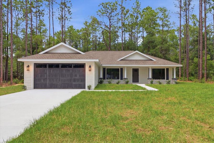 Front exterior of a new home in , Hernando, FL, highlighting curb appeal (Image 1). Front exterior of a new home in , Hernando, FL, highlighting curb appeal (Image 1).