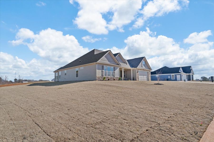 Representative exterior photo of a completed home built from the Converse by Enchanted Homes in Messer Farms, Inman, SC (Image 21).