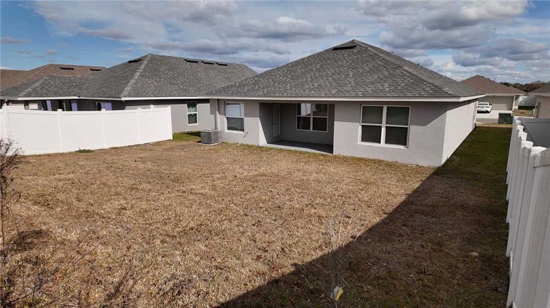 Exterior details and patio area of a home in Pine Bluff, Spring Hill (Image 29).